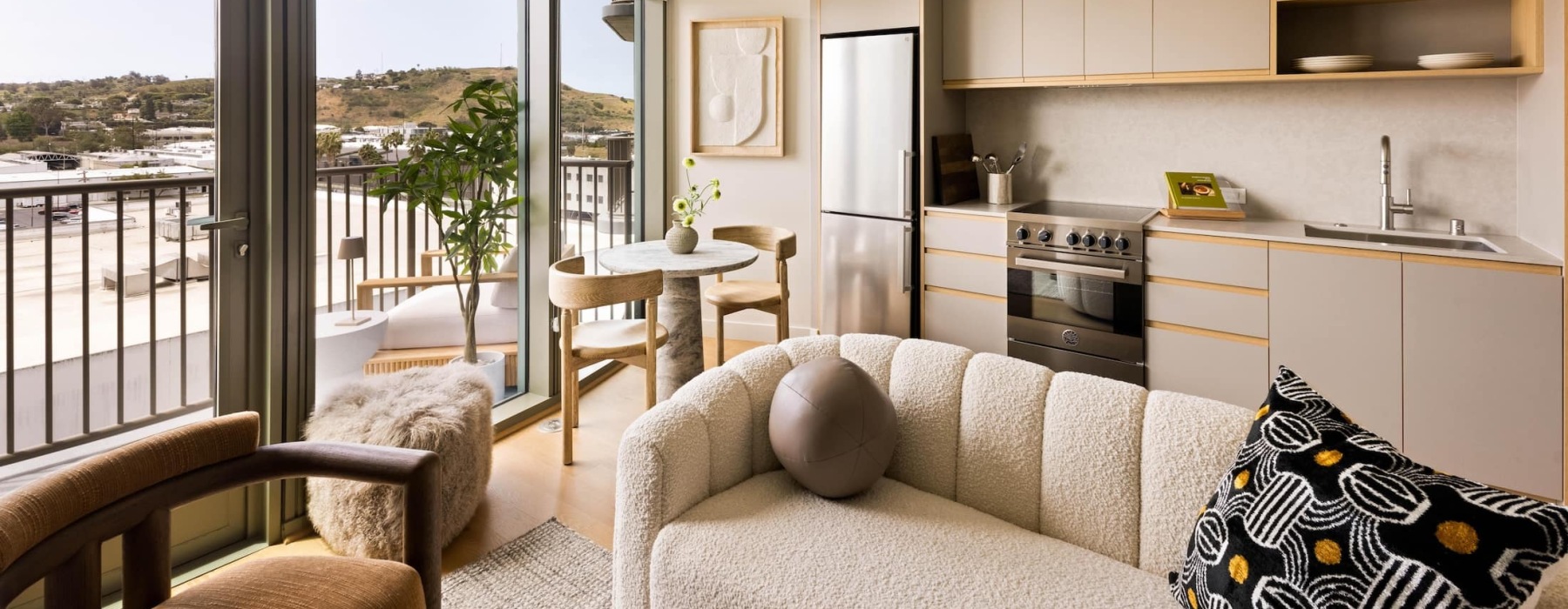 living area that includes ample seating spaces and bright lighting